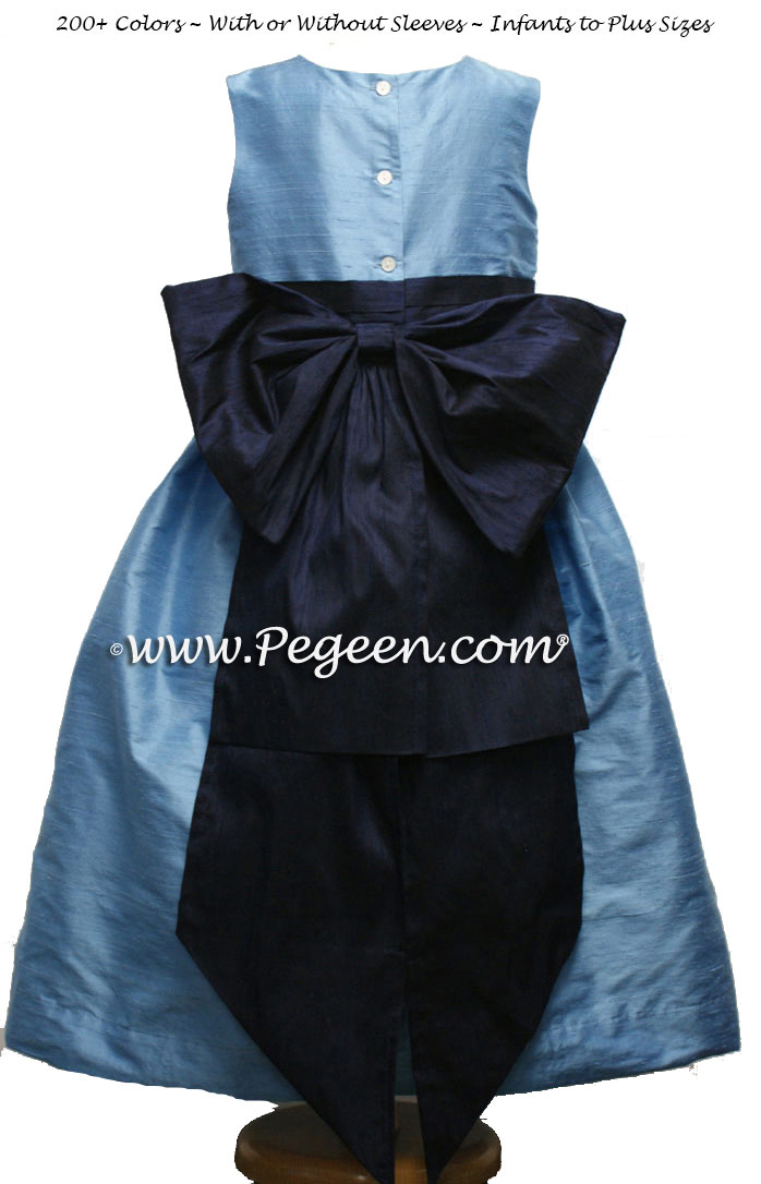 MEDIUM BLUE AND NAVY FLOWER GIRL DRESSES IN SILK WITH BACK BUSTLE