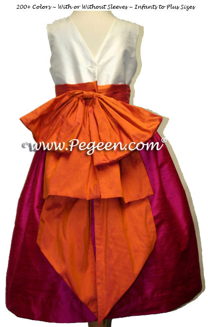 Flower girl dress with V-Back in raspberry pink  and mango orange | Pegeen