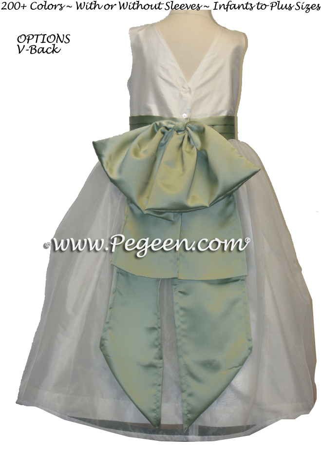 Matching Jim Hjelm flower girl dresses in green and antique white silk