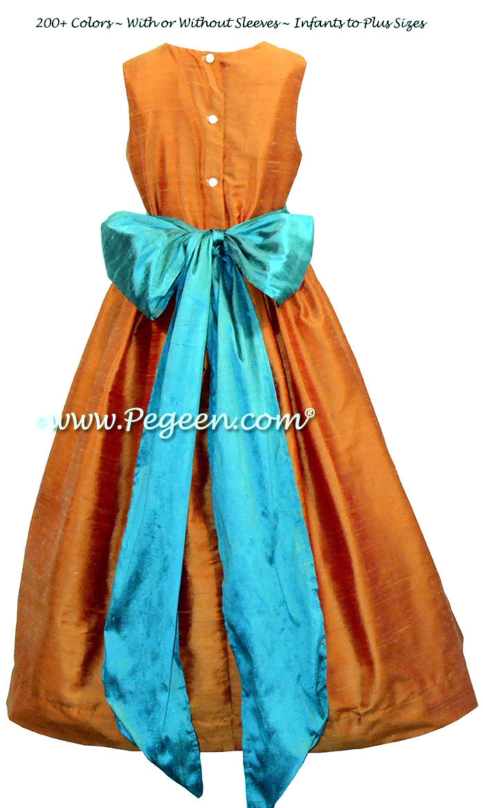 Pumpkin Orange and Blue Juniper flower girl dresses by Pegeen