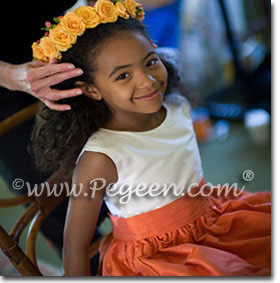 Orange flower girl dresses by Pegeen