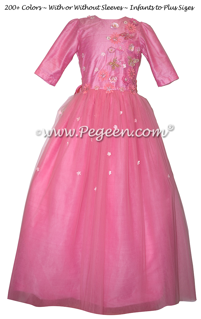 Rose and coral shades of tulle and appliqued bodice on flower girl dress