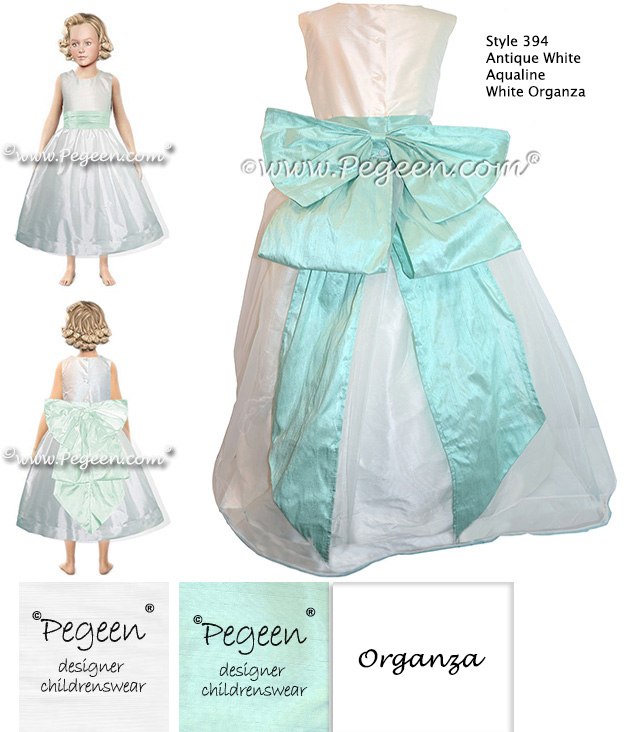 Flower girl dress is style 394 Antique White, Aqua & Organza