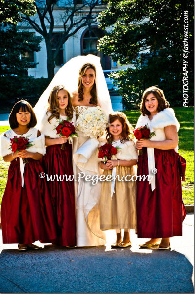 The customer used different styles for her flower girl dresses in Christmas colors