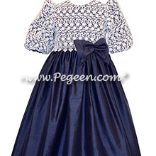 Navy silk and white embroidered lace with 3/4 sleeves and high neck