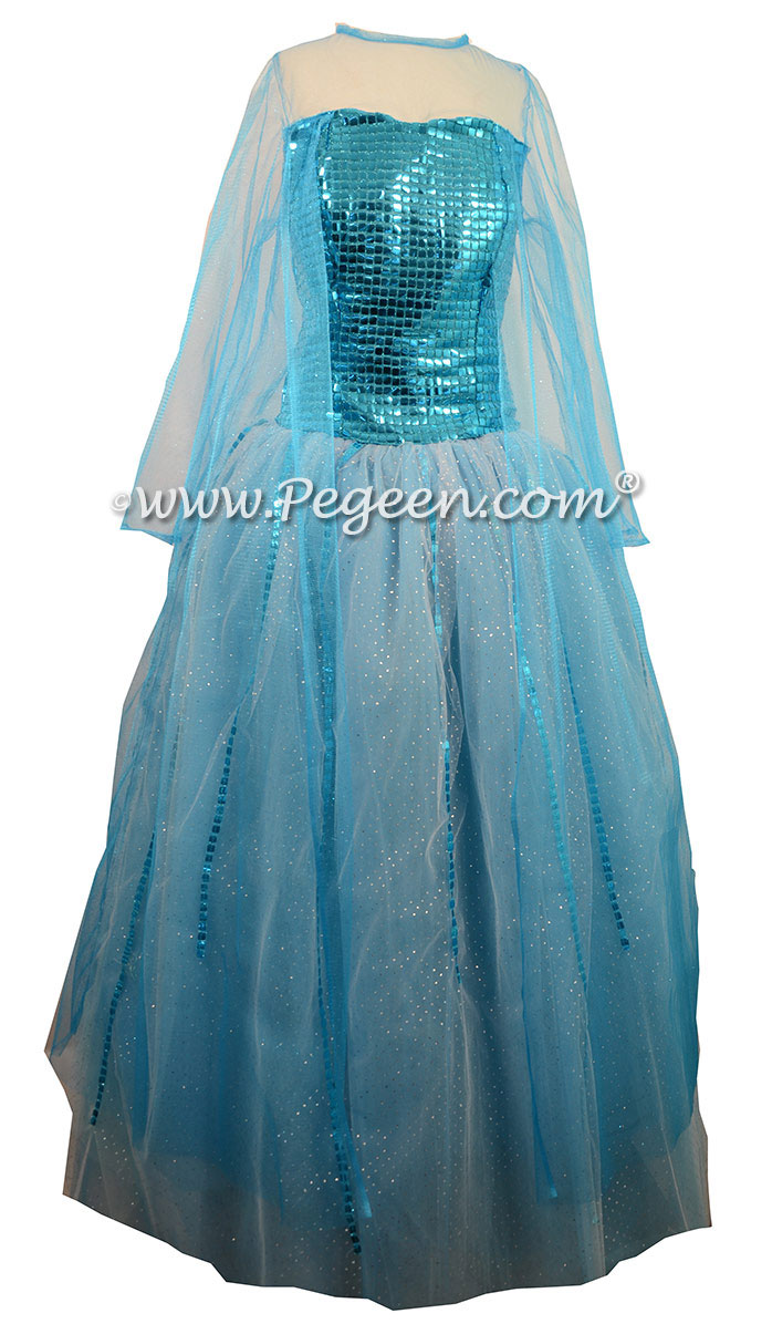 Turquoise Silk and Tulle with a Sequin Bodice, Glitter Mesh Sleeves and Cape with Multi Layered Colors of Tulle.  Silk Style 908 Flower Girl Dresses called Blue Diamond Elsa Dress