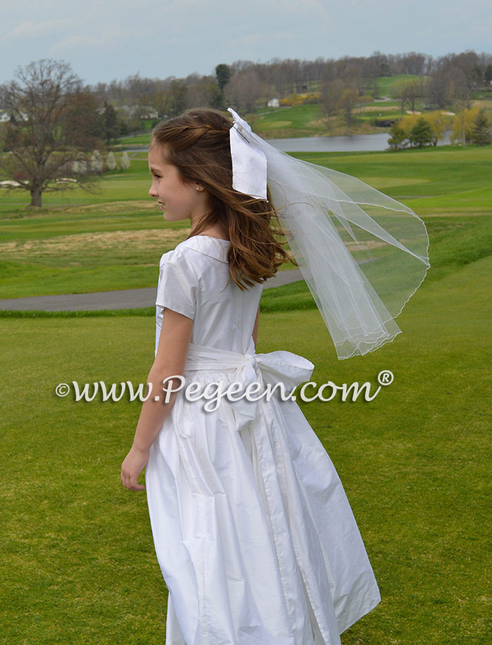 Antique White silk First Communion style dresses trimmed with pearls and rhinestones