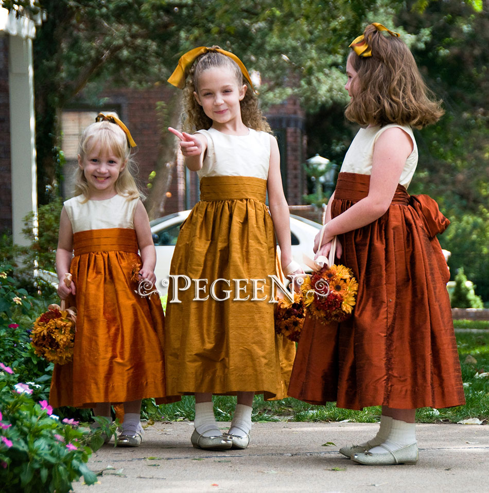 Shades of the fall makes for a classic flower girl dress look