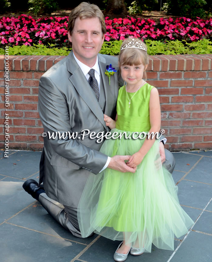 ballerina style flower girl dress with layers of tulle in sprite green and silk