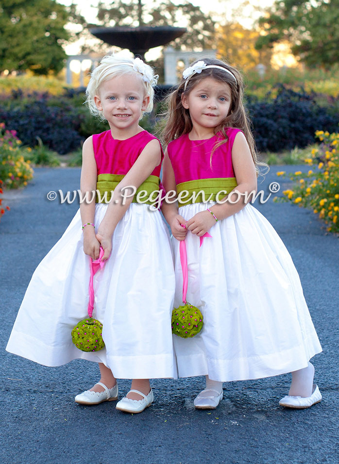 Hot pink, grass green and white flower girl dresses with a fabulous flower ball makes this smashingly beautiful