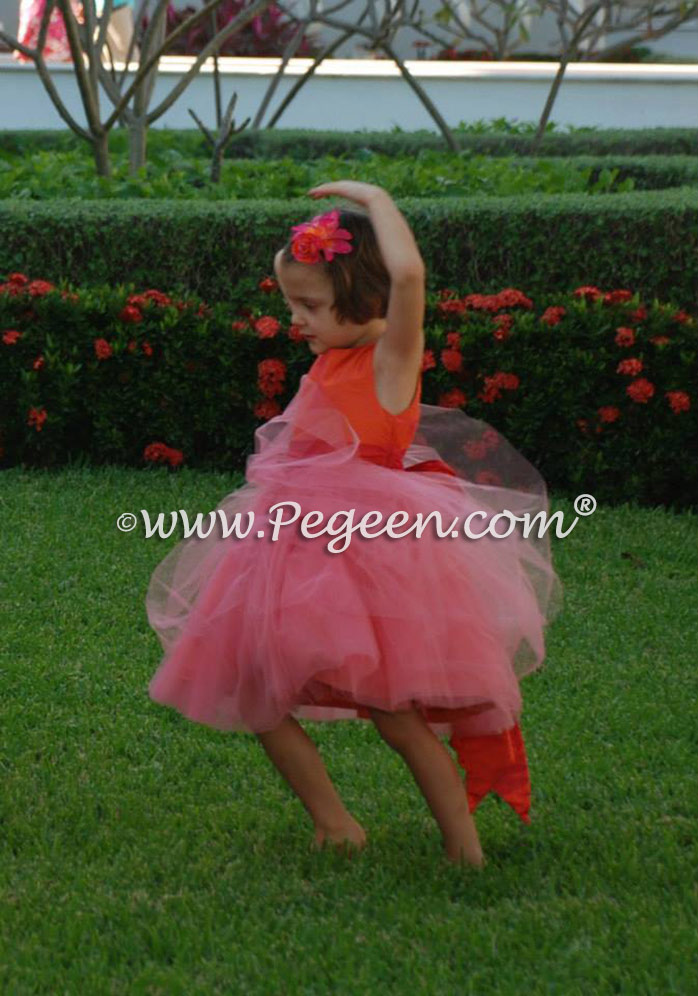 Tulle flower girl dresses in mango orange and coral pink