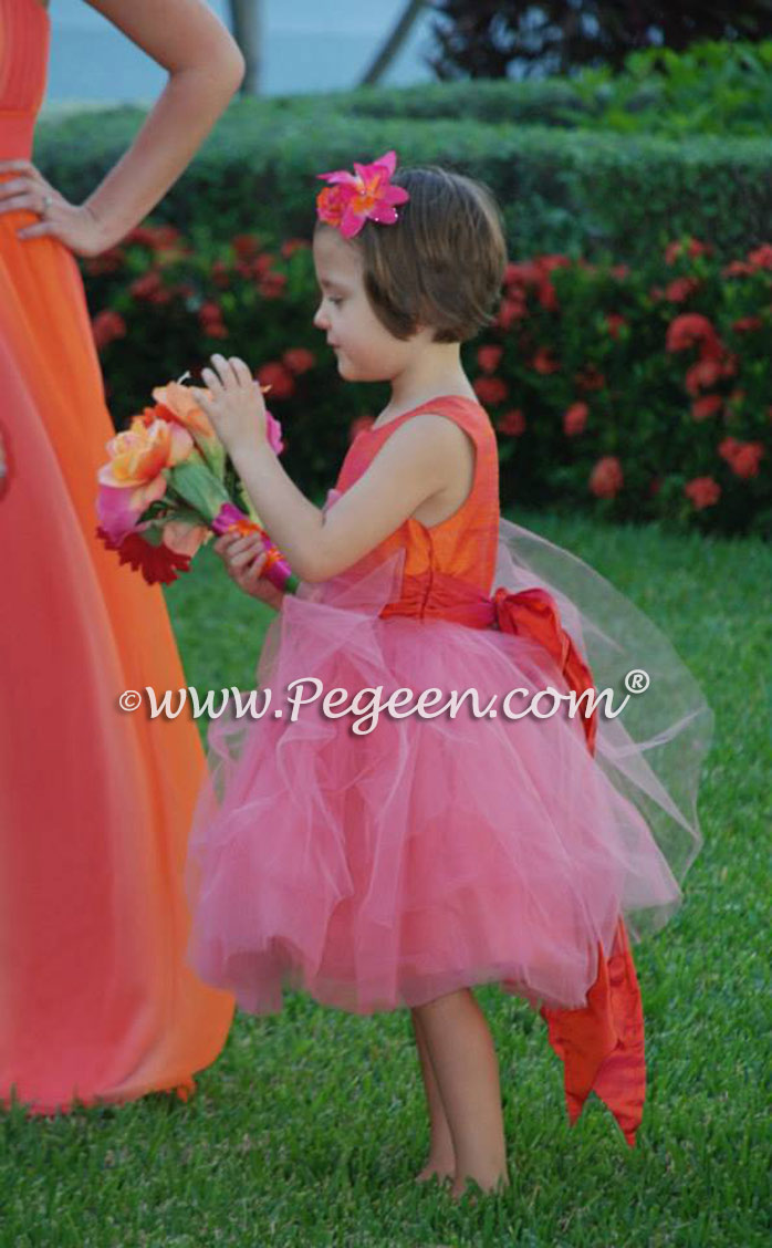 Tulle flower girl dresses in mango orange and coral pink