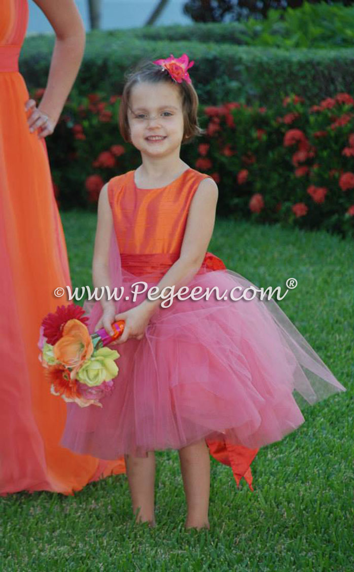 Tulle flower girl dresses in mango orange and coral pink