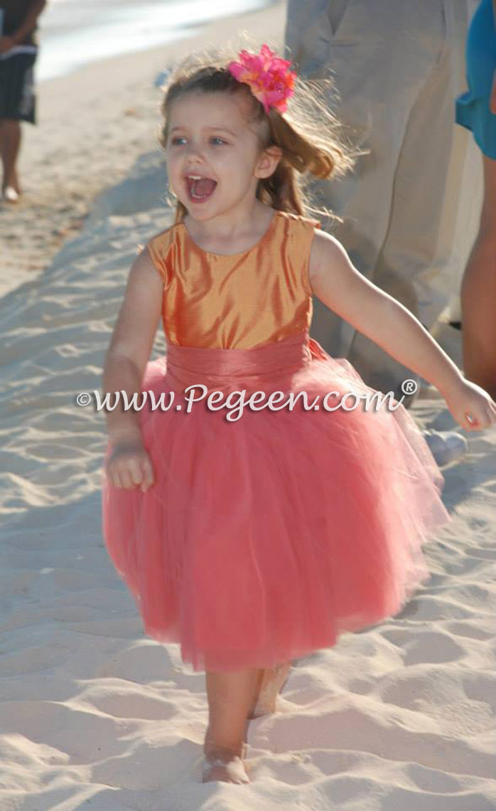 Tulle flower girl dresses in mango orange and coral pink