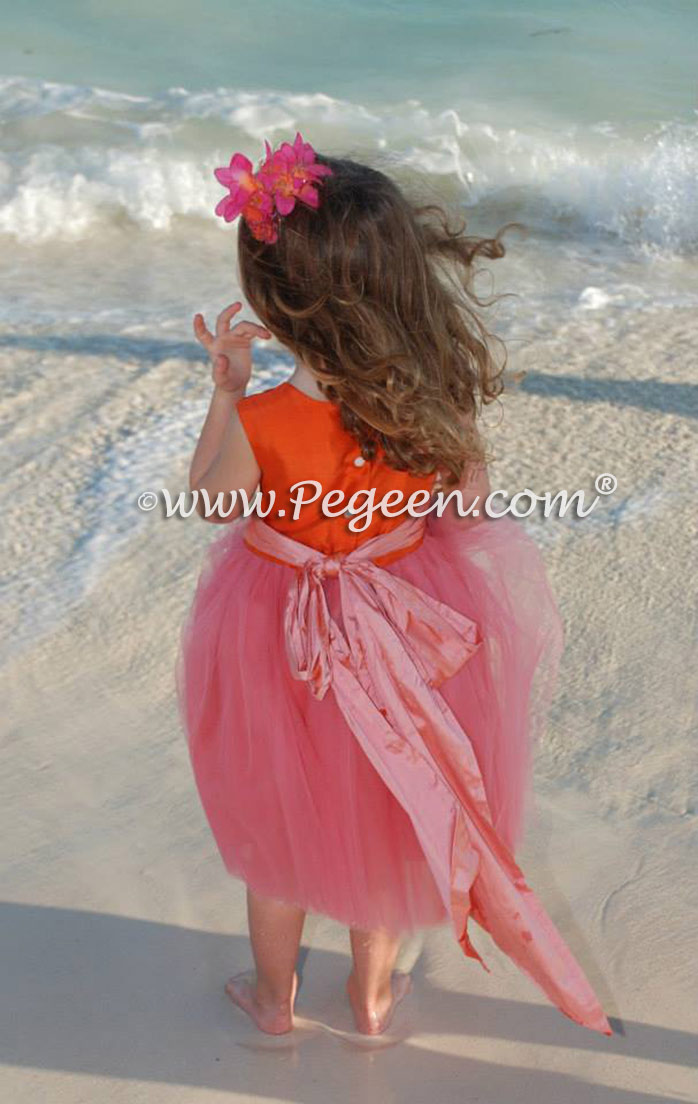 Tulle flower girl dresses in mango orange and coral pink