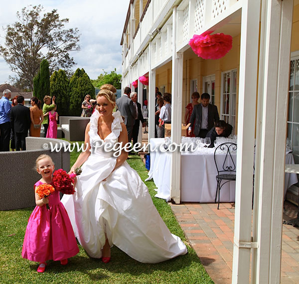 Custom Flower Girl Dresses Style 383 in Hot Pink Shock with matching Jr. Bridesmaid Style 320