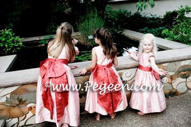 Pink and coral silk flower girl dresses by Pegeen