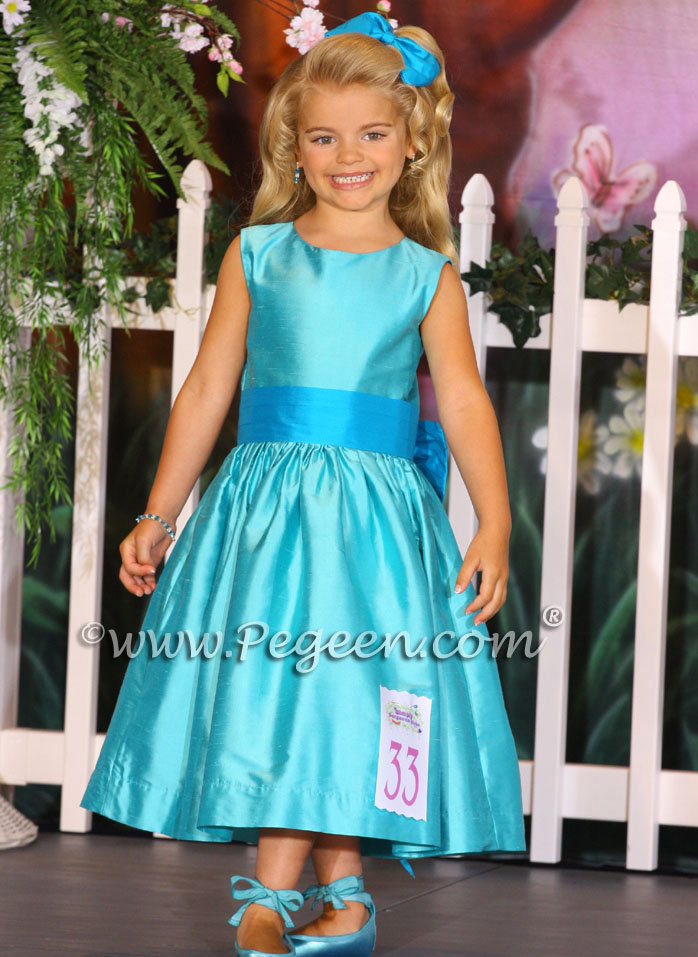Style 345 pageant dress in Tiffany blue and turquoise with Cinderella Bow