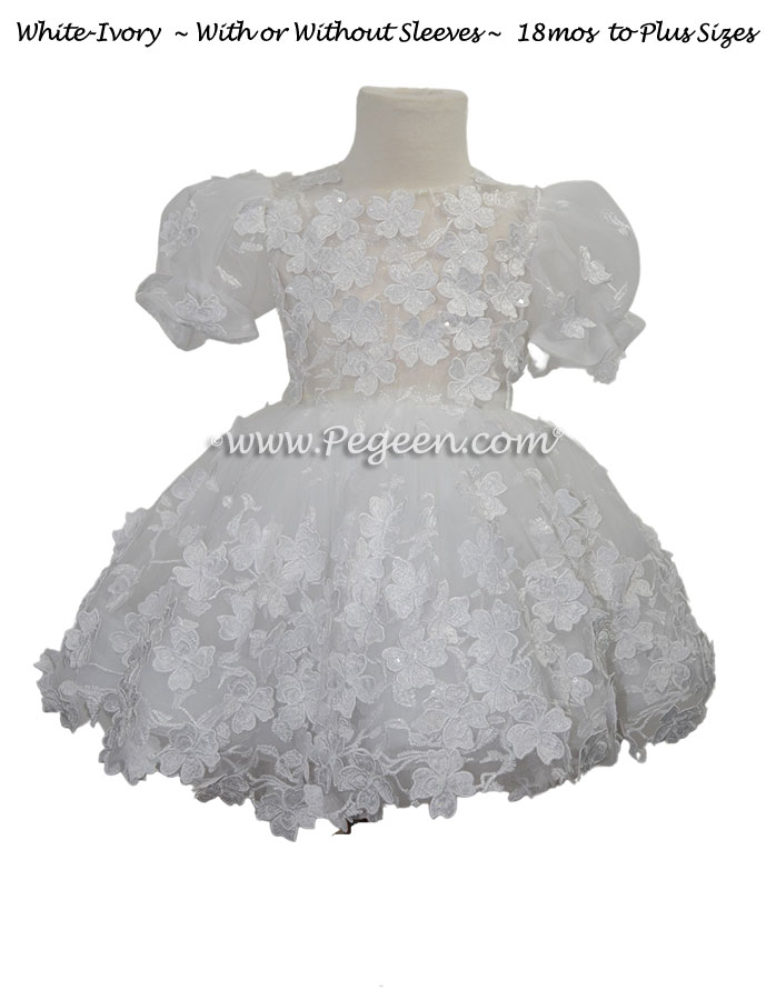 White tulle and beading trimmed flower girl dress with 3D flowers on netting