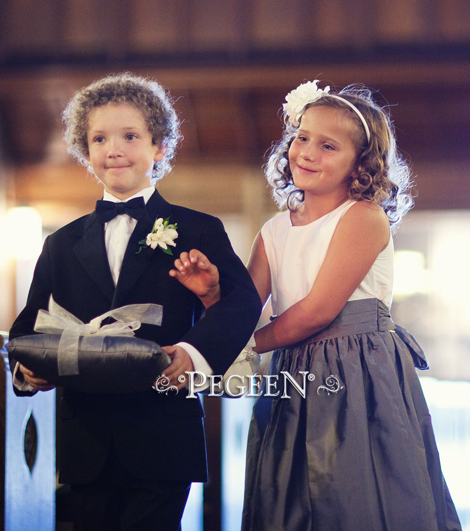 The bride chose Medium Gray and Antique White silk for her flower girl dress in style 398