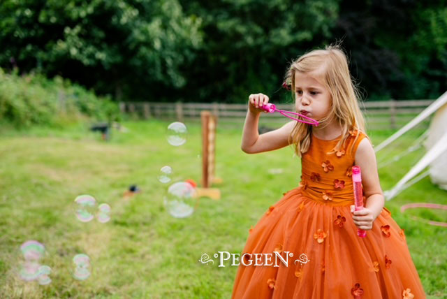 Pumpkin Orange silk flower girl dress with hydrangea flower trim