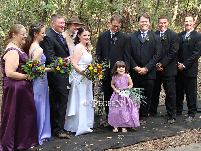 Plum, lavender and amethyst make a great pairing especially with charcoal grey suits for the men