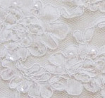 Ivory beaded aloncon - shown on creme fabric
