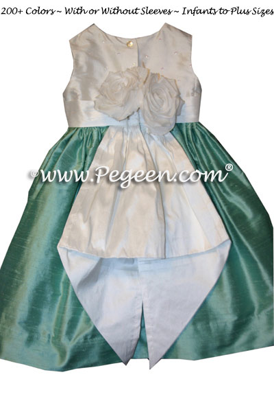 Infant silk dress with sequinned top and tiffany or aqua and white silk by Pegeen
