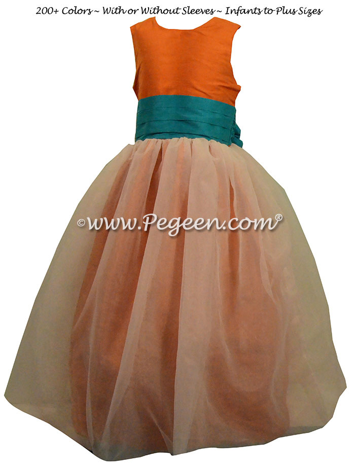 Carrot Orange and Oceanic (teal-blue) flower girl dresses by Pegeen