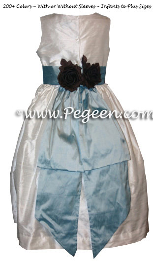 Matching Jim Hjelm white and caribbean flower girl dresses by PEGEEN