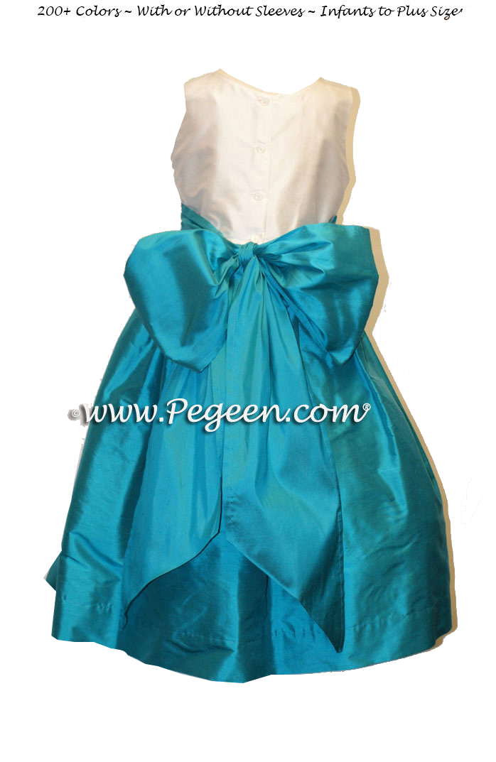 Flower girl dresses in silk Ivory and Oceanic (turquoise) | Pegeen