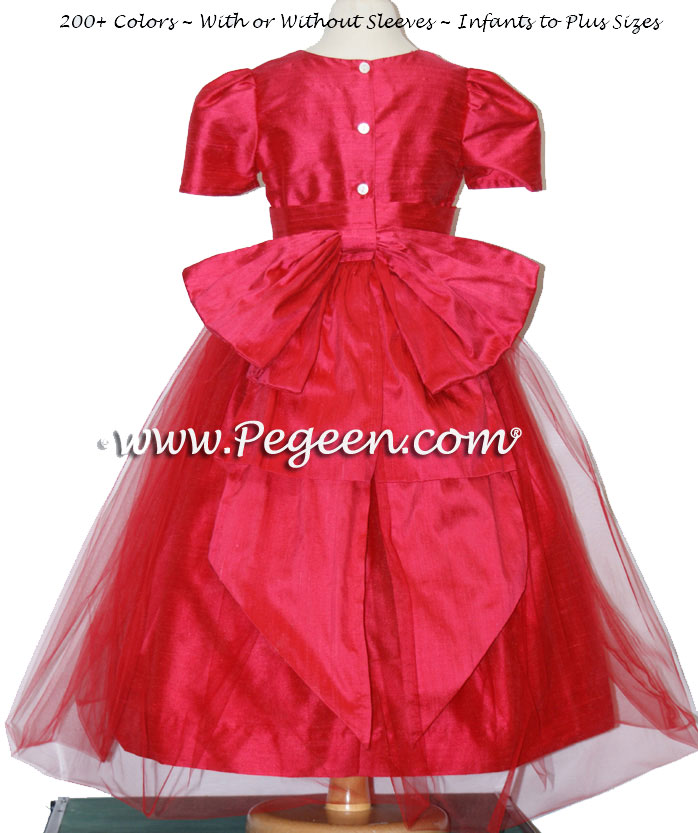 Custom flower girl dress in lipstick pink with Cinderella bow