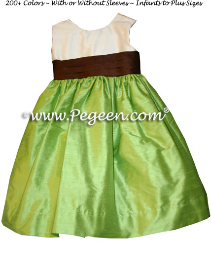 Flower girl dresses in shades of green and contrast sash and spun gold