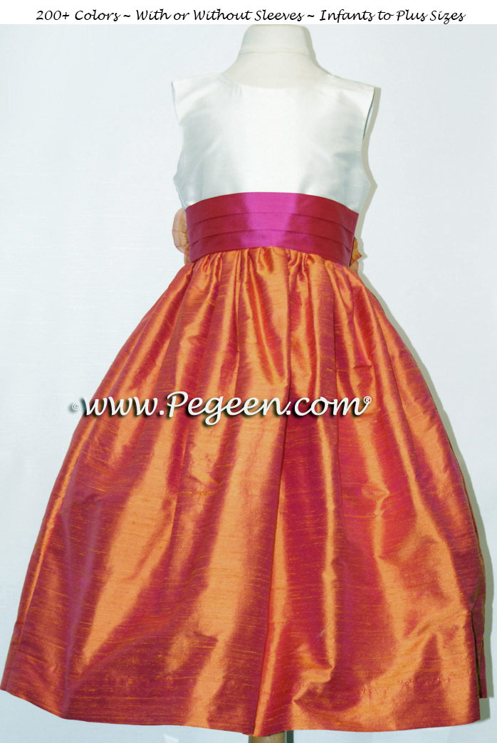 Flower girl dress in mango orange, sorbet pink and ivory silk | Pegeen