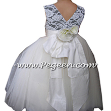 Flower Girl Dresses with beaded and sequined aloncon lace in black and ivory with layers and layers of tulle