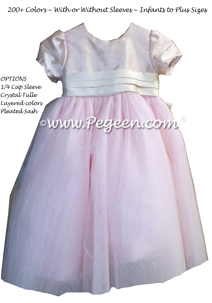 Flower girl Dresses in blush pink with a Special Back Flower