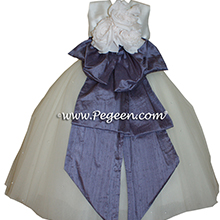 FLOWER GIRL DRESS IN EUROLILAC TULLE AND PEGEEN SIGNATURE BUSTLE