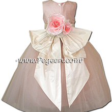Petal pink tulle with bisque creme sash flower girl dress