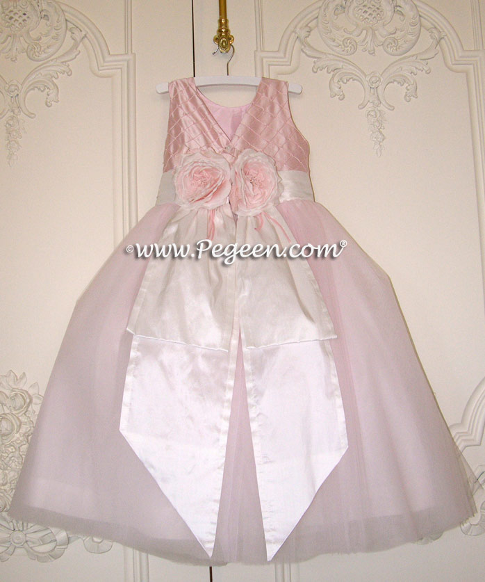 Pintuck and pearls in petal pink Tulle flower girl dress with 10 layers of tulle