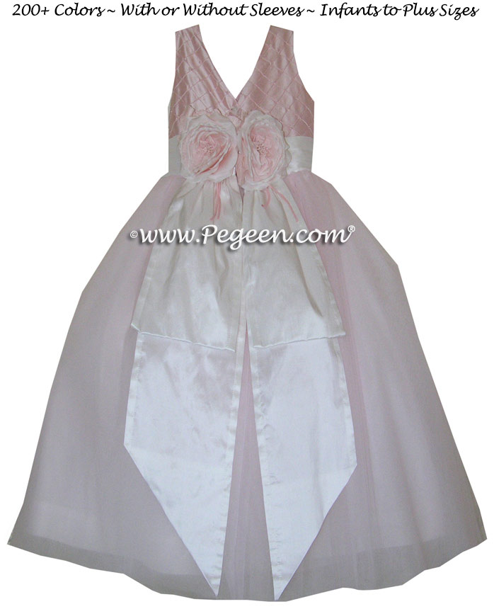 Pintuck and pearls in petal pink Tulle flower girl dress with 10 layers of tulle