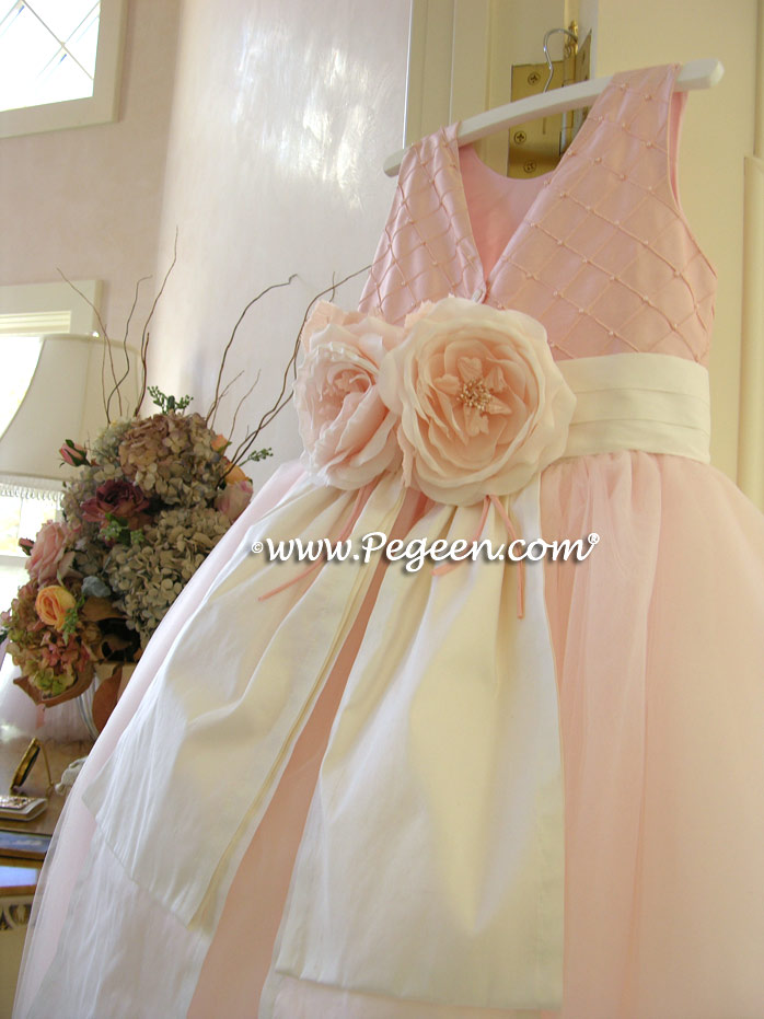 Pintuck and pearls in petal pink Tulle flower girl dress with 10 layers of tulle