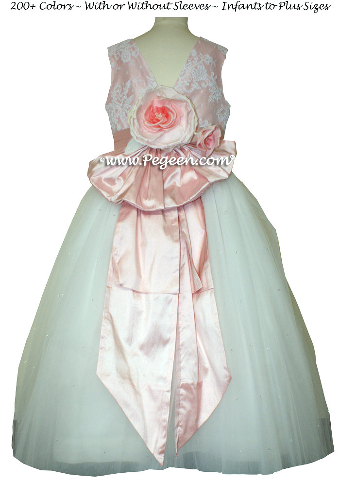 White and peony pink ballerina style flower girl dresses with layers of tulle