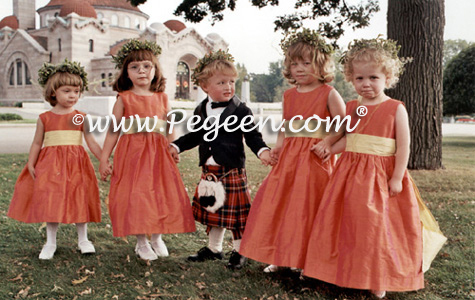 Sunflower yellow and mango orange flower girl dresses by Pegeen