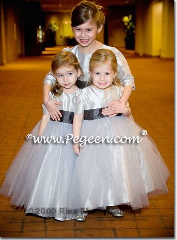 Flower girl dresses and Jr Bridesmaids dresses with long sleeves and high necks  on gray tulle dress