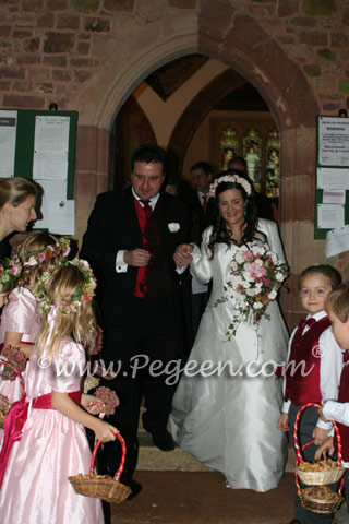 Pink and claret red silk flower girl dresses in London wedding