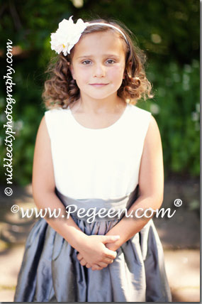 The bride chose Medium Gray and Antique White silk for her flower girl dress in style 398