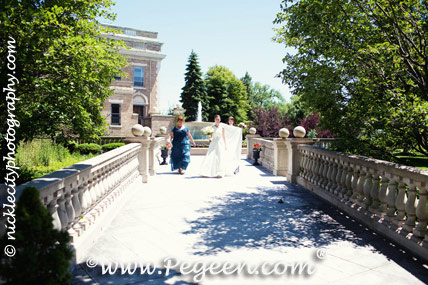 The bride chose Medium Gray and Antique White silk for her flower girl dress in style 398