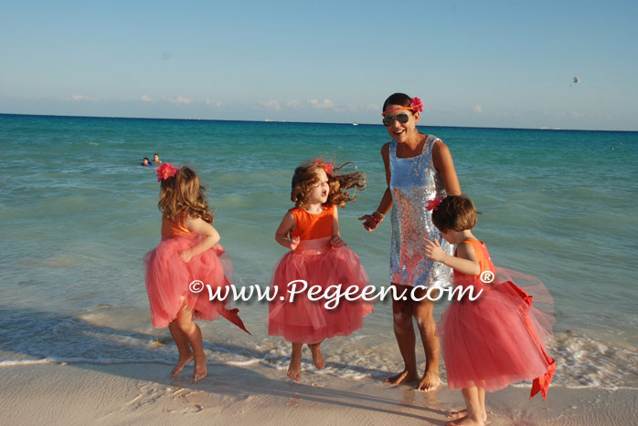 Tulle flower girl dresses in mango orange and coral pink