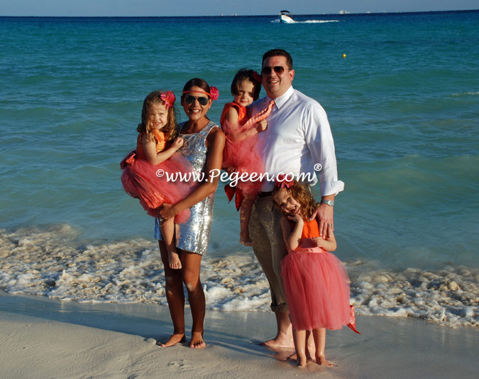 Tulle flower girl dresses in mango orange and coral pink