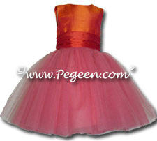 Tulle flower girl dresses in mango orange and coral pink